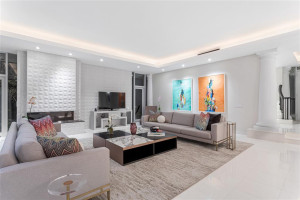 Comfortable living open room with great views to waterway.