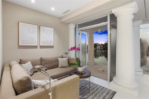 Sitting area in the Primary bedroom with access to the private balcony.