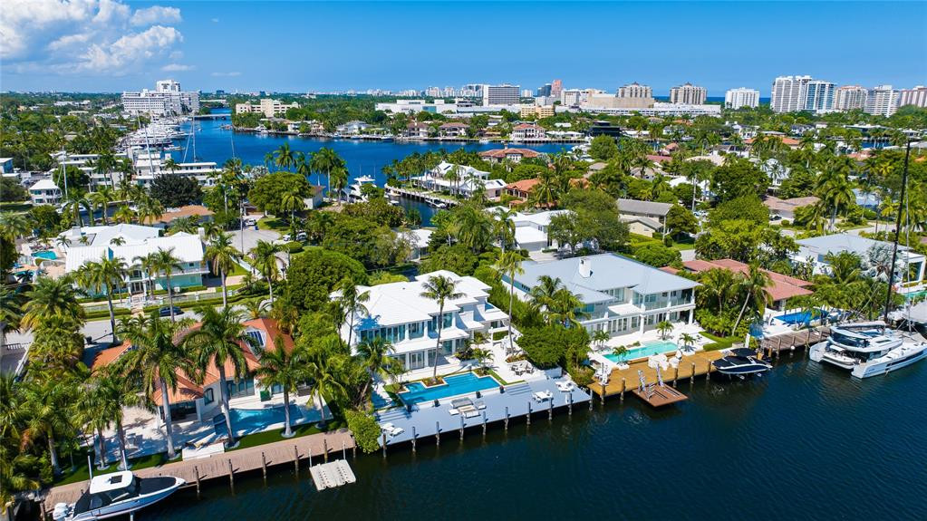 Aerial of the backyard and waterway.