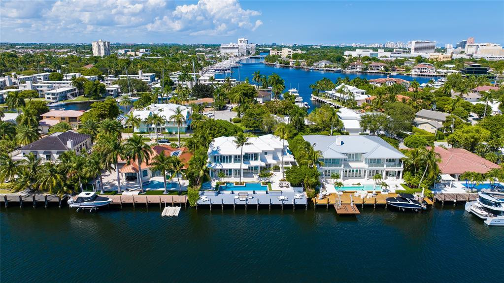 Aerial of the backyard and waterway.