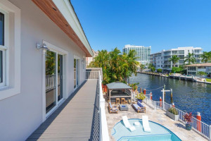 Second Floor Owner's Suite Balcony Overlooking Pool and Canal/Intracoastal