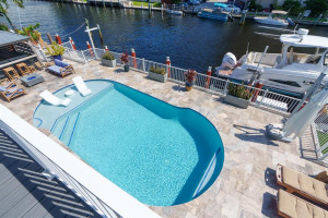 Second Floor Owner's Suite Balcony Overlooking Pool and Canal/Intracoastal