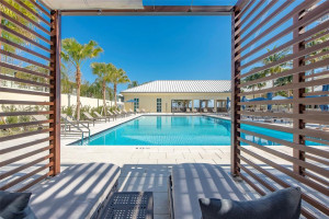 Heated pool and cabanas at Sea Ranch Lakes Beach Club