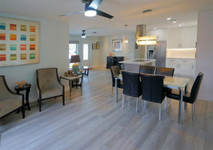 Family or TV room opens to the covered patio and pool.