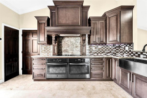 w/ double ovens , upgraded range hood, 2 spice racks