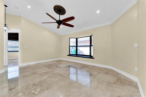 With vaulted ceilings & newly polished travertine floors throughout