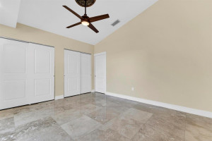 Wall to wall closets with built-ins, upgraded fan & closet doors