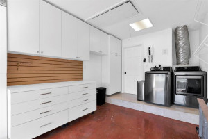 Photo for 9975 SW 59th Court, Cooper City, FL 33328 - Listing #FX-10426005 Built in cabinets for extra storage & wall slat board for organization