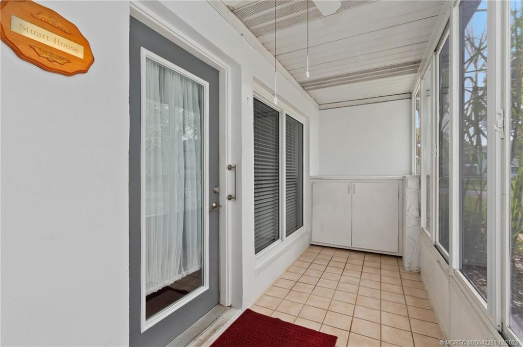 Air conditioned space. House windows are impact glass. Porch windows are not impact.