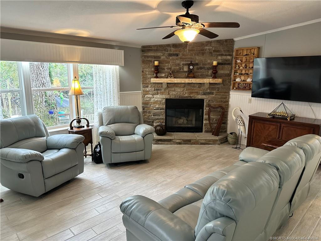 Riverfront Living Room with real brick fireplace