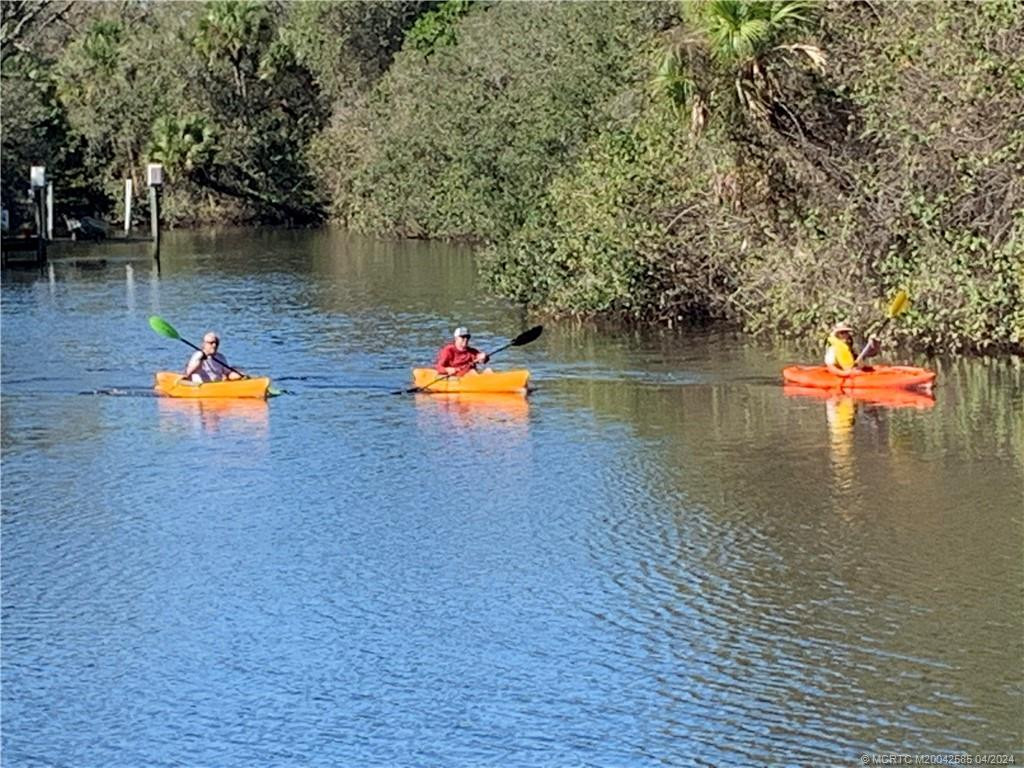 Kayakers on the river nearby