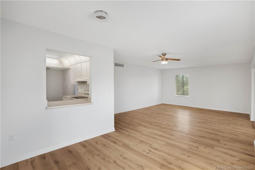 Dining Area with new light fixture and flooring