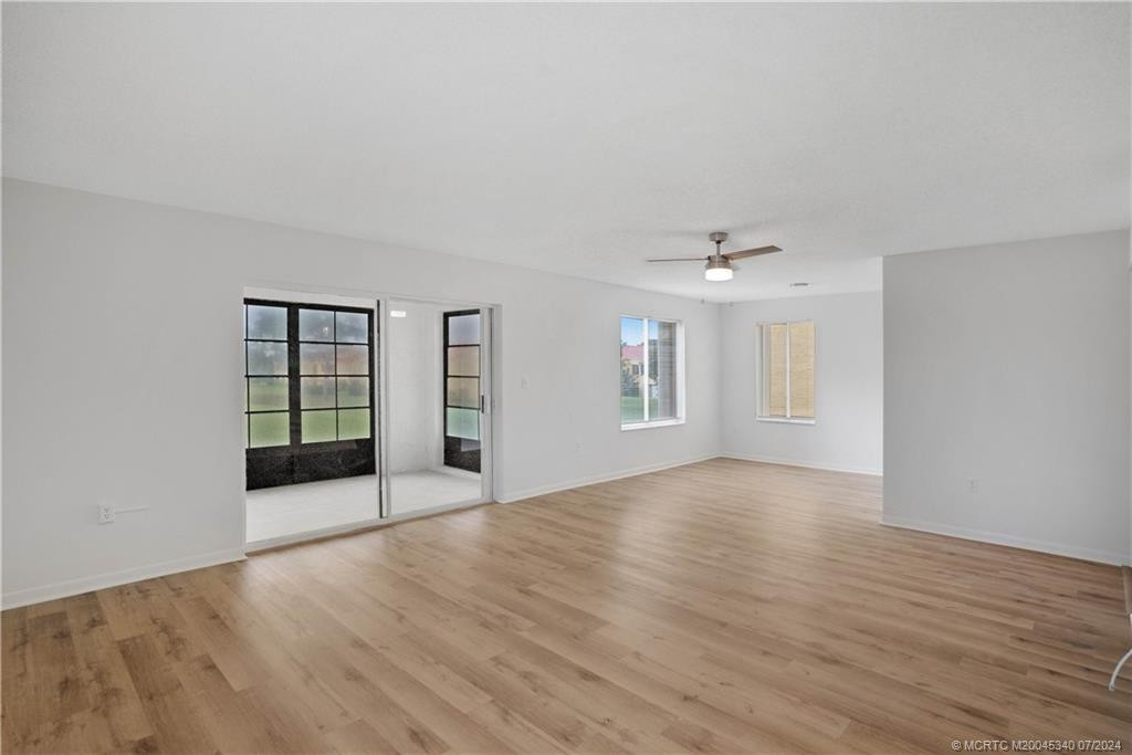 New Flooring and light fixtures in Living Room