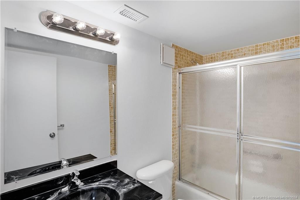 Guest Bathroom with combination Tub and shower.