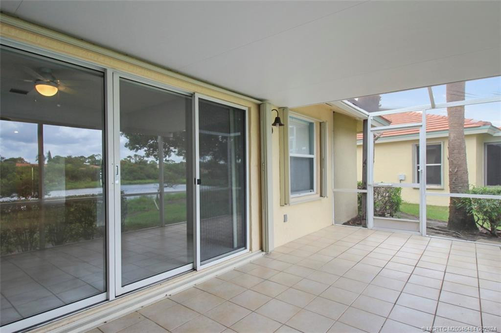 sliding door overlooking pond