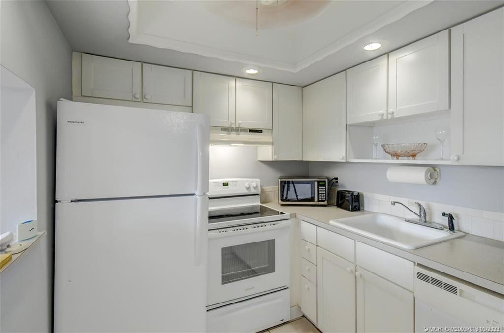 Kitchen with Newer Refrigerator