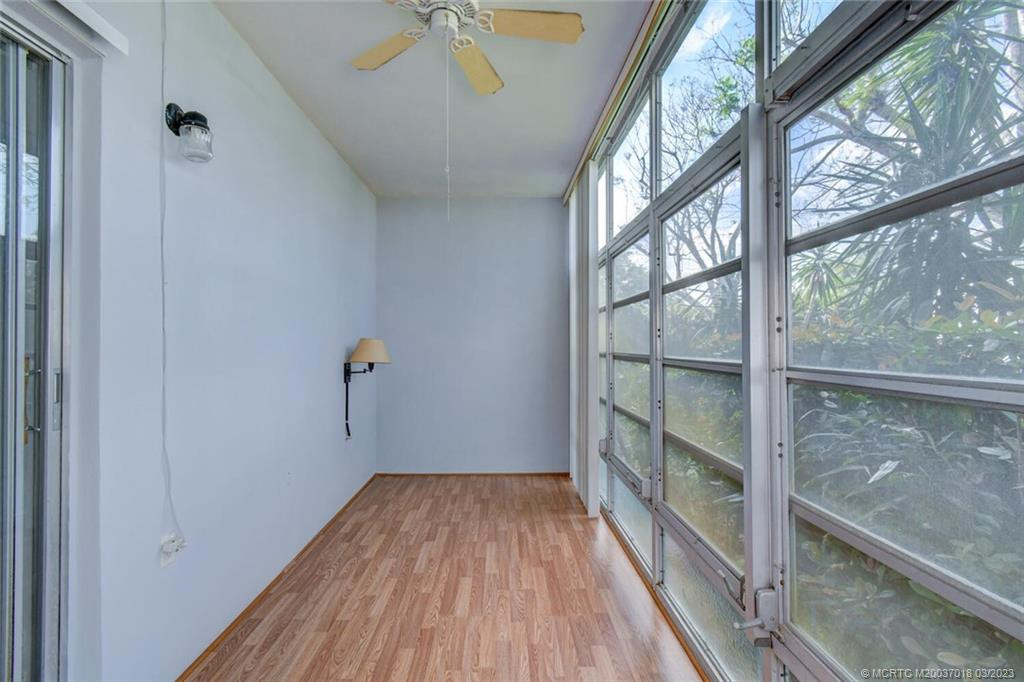 Enclosed Patio with Newer Vinyl Flooring