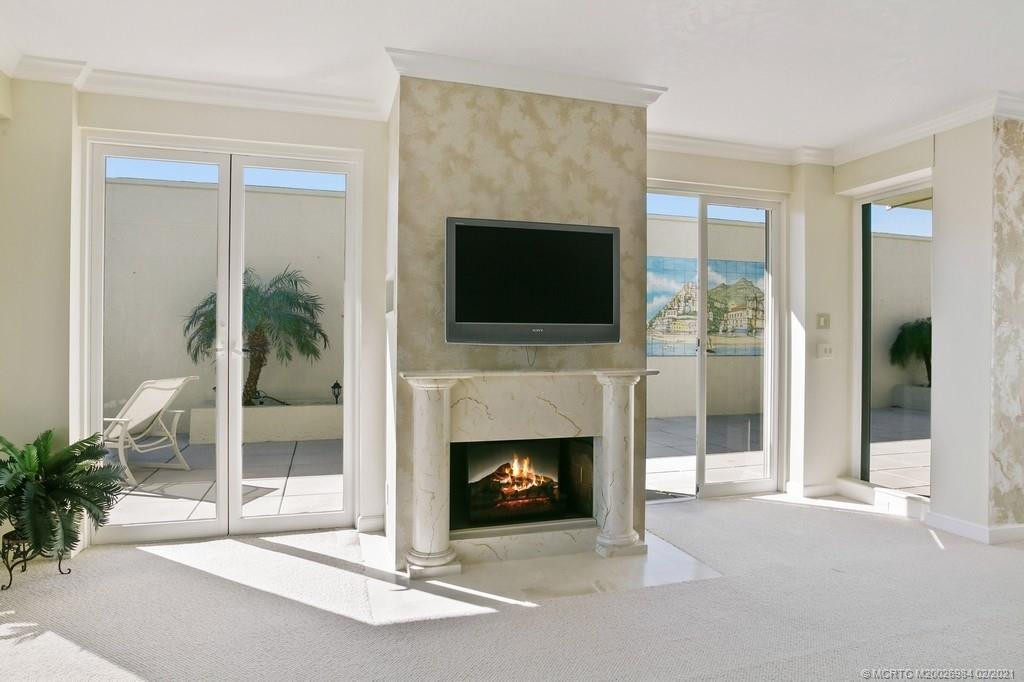 electric fireplace can be wood burning (flames virtually staged)