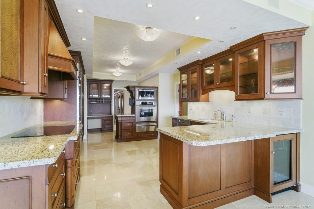 spacious kitchen with granite counters