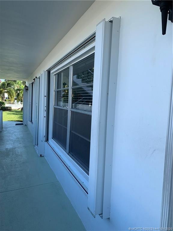 Accordion Hurricane Shutters throughout