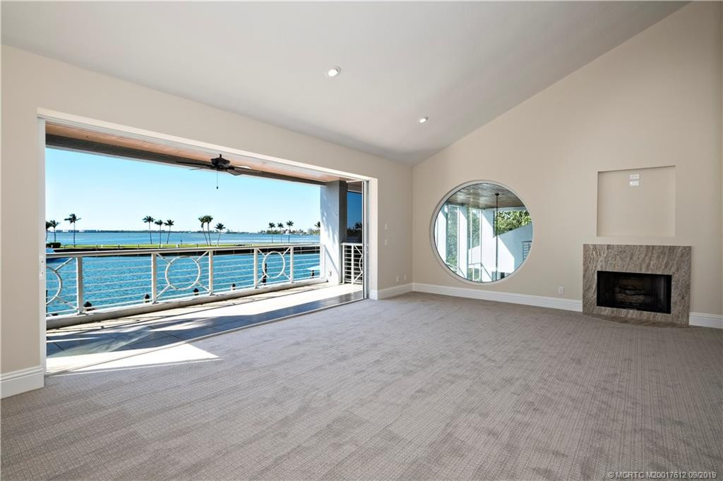 Upper level bedroom ensuite with fireplace, walk-in closet and stunning views! Could be a Master Bedroom!