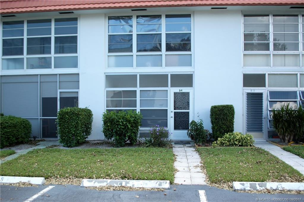 Rear porch entry with parking space #4 right behind unit for convenience.