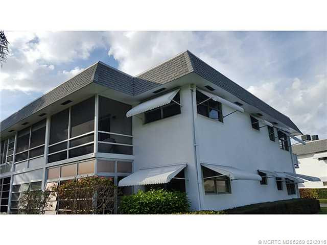Exterior Back. Screened lanai, End unit. 2nd fl. Lots of windows.