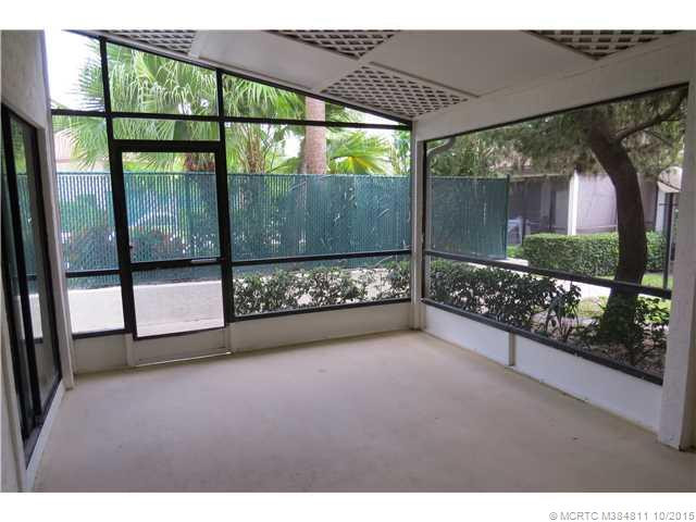Patio/Deck. Back door of the porch leads to the clubhouse and pool