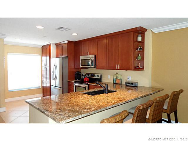 Kitchen. Walls taken down and ceilings raised, very open!