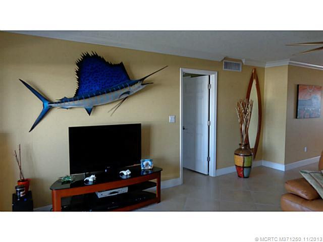 Living Room. Tile and Crown throughout