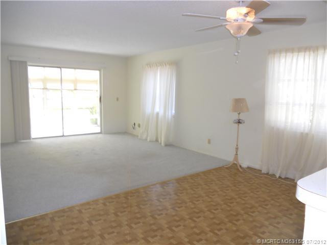 Living Room. LR/DR has Enclosed Patio