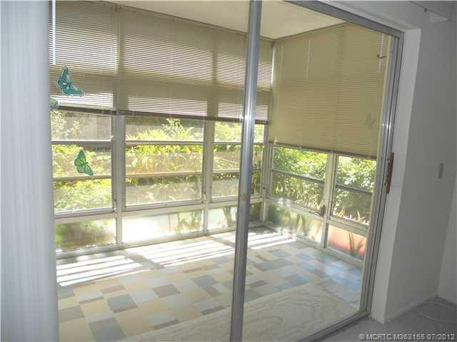 Patio/Deck. Enclosed Patio has screens and jalosy windows.