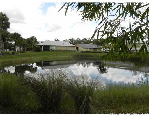 Other. Pond with view of home