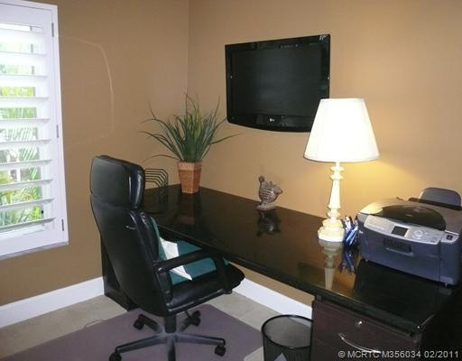 Studio/Study/Office. Built-in Flat Screen TV & Granite Desk make a perfect home office in Guest Bedroom