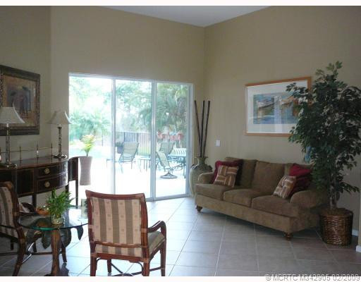 Living Room. Formal living room and dining are additional living space to great room with eat in kitchen and family room. Living room opens to even more outdoor living space in covered patio area.