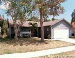 Property photo for 4063 SE Jacaranda Street, Stuart, FL 34997