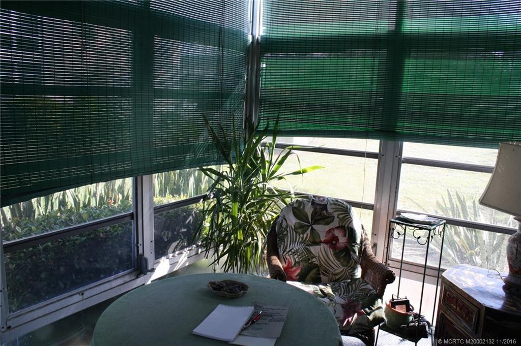 Relax in private on the enclosed porch.