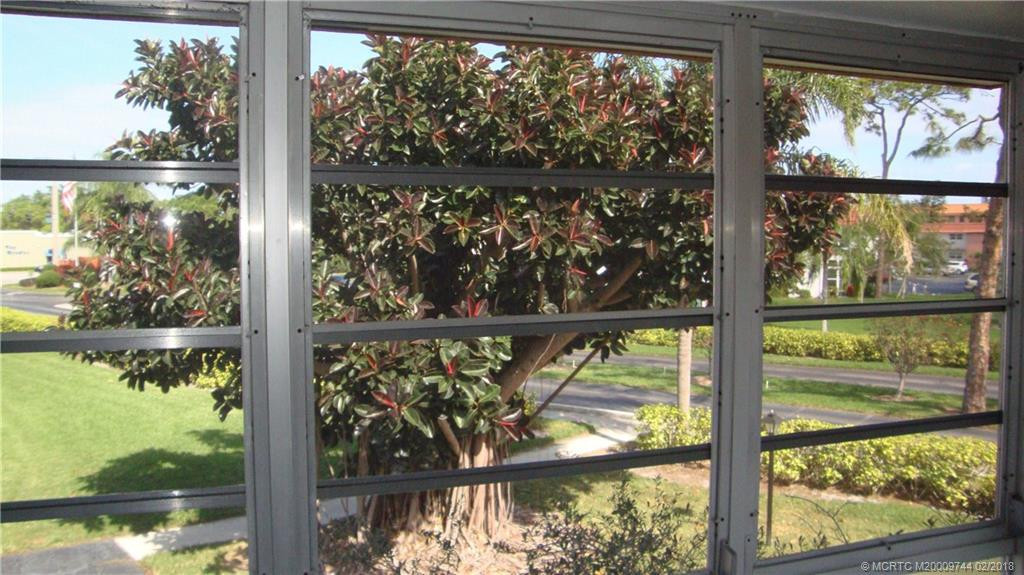 Enclosed porch. Open the windows and the front screened door and enjoy the great ocean breezes most of the year.