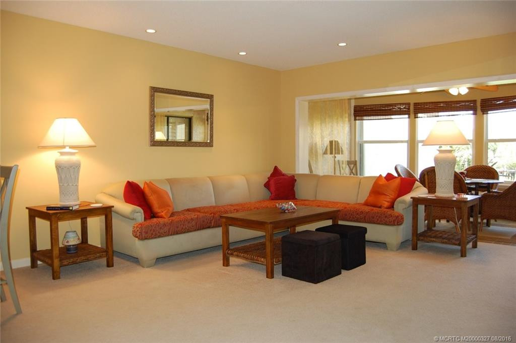 The living area has great views of the lagoon beyond!