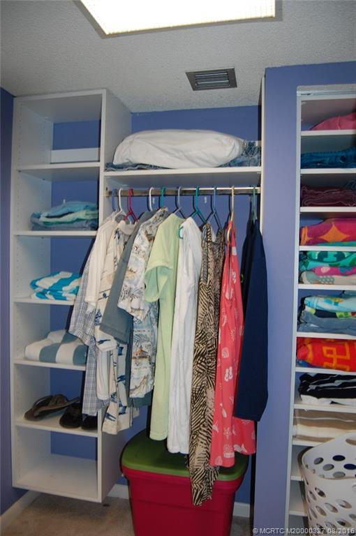 Both bedrooms have walk-in closets for plenty of storage and there's an exterior storage closet for the unit too.