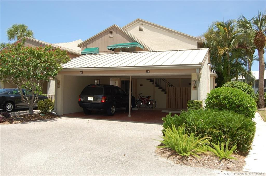There's a carport and adjacent guest parking.