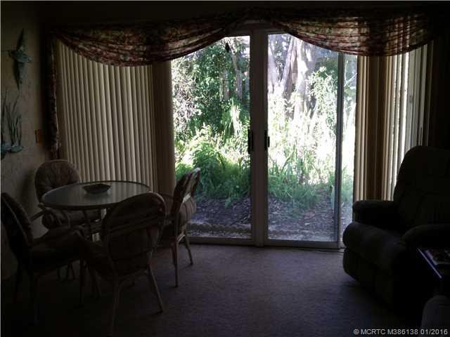 Other. Sliding doors enclose the lanai for added space.