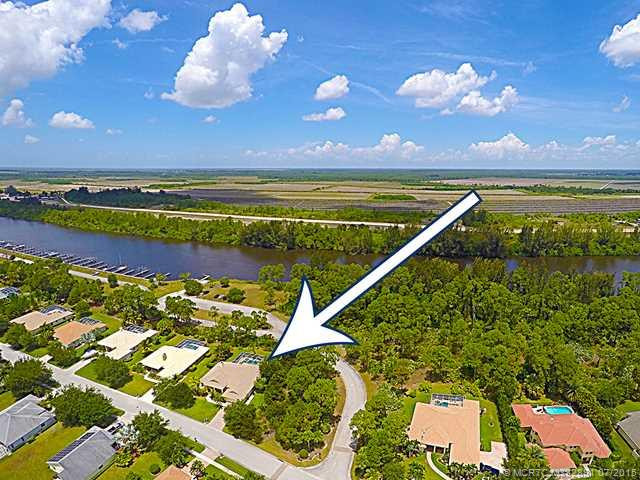 Aerial View. Great lot location near the docks and nobody can build in the vacant lot next to you!