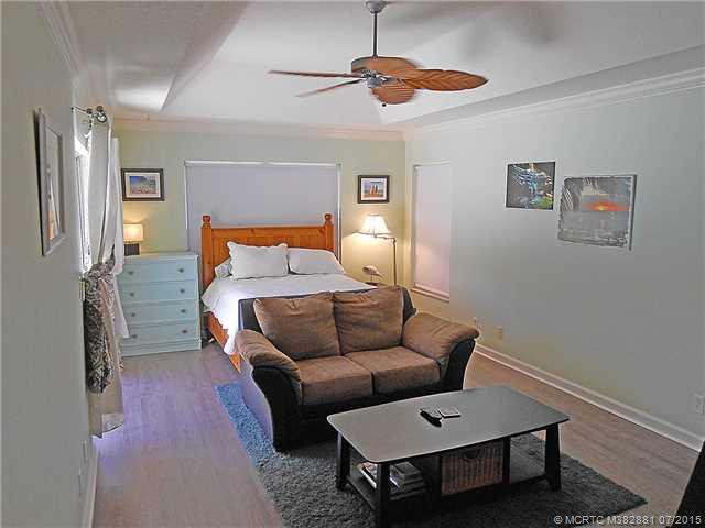 Other. Second bedroom suite is on the opposite side of house from master. Large enough for it s own sitting area and opens to pool and lanai.