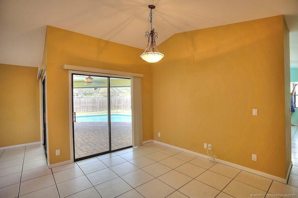 Two sliders leading the pool & patio