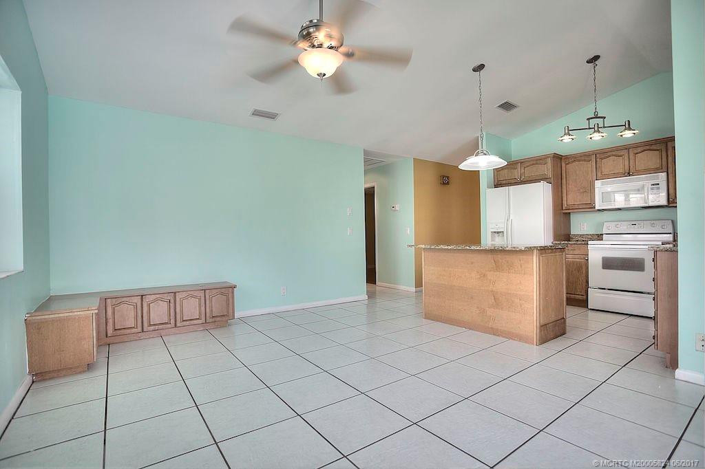 Family room with center kitchen island for entertaining.