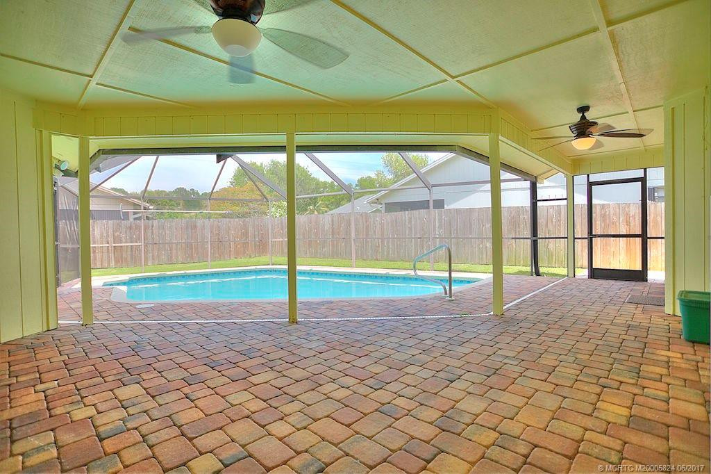You will love the Screened Patio & Pool area with tasteful pavers.