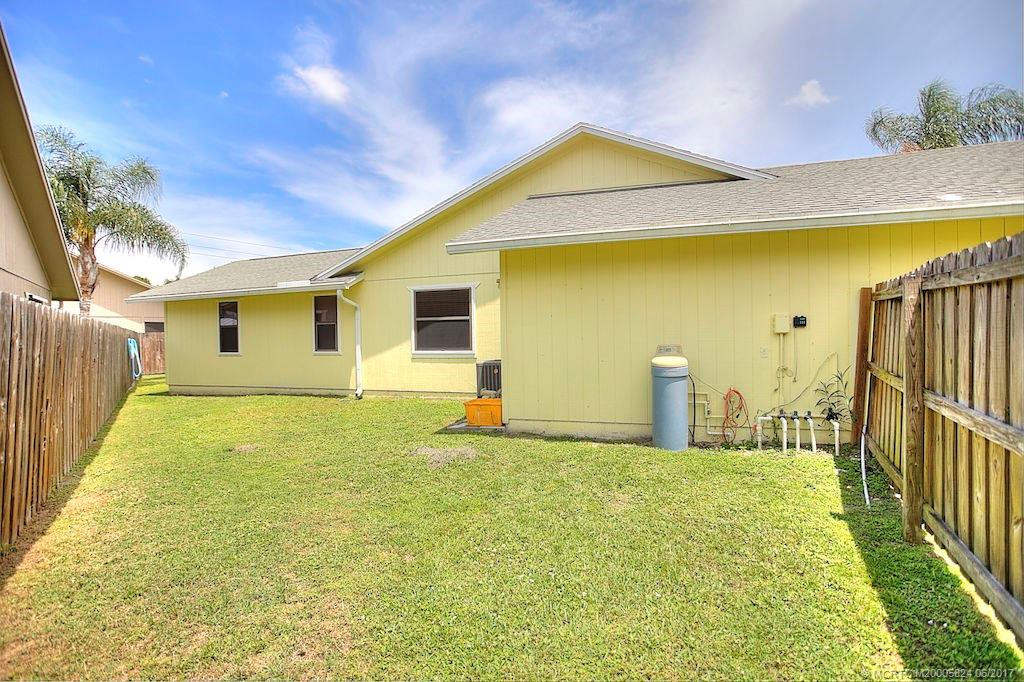 Side Yard- Back yard has privacy fence