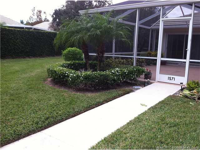 Exterior Front. large screened enclosure