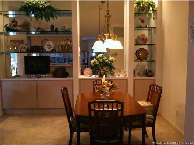 Dining Room. Dining space shares the wall unit and living room- elegant and comfortable floorplan